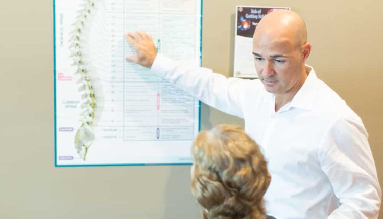 dr tony scoliosis exam
